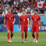 스위스와 캐나다의 2026 월드컵 B조 경기 장면, 스위스 선수들이 득점 후 기뻐하는 모습