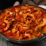 생생정보통 맛집오늘방송 대박 낙지볶음 생생 정보통 오늘 방송에서 소개한 낙지야 놀자 대박 낙지볶음 사진. 빨간 양념과 푸짐한 낙지가 담긴 접시