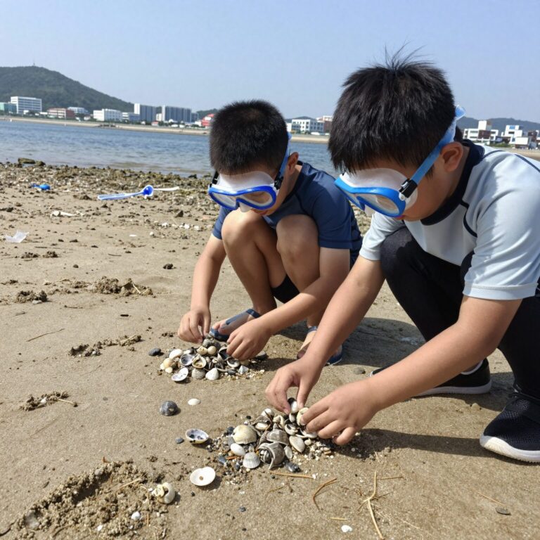 어린이가 수이즈 스노쿨링 마스크를 착용하고 바닷가에서 조개를 찾고 있는 모습